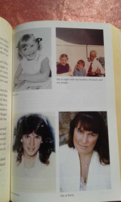 `Never Alone`   Soft cover.  Debbie Malone.  Soft cover.