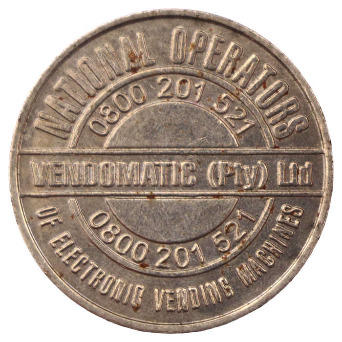 National Operations Vendomatic Token `Persons under the age of 16 are prohibited from purchasing cig