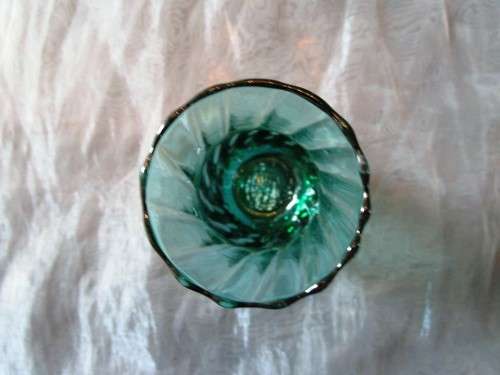 I HAVE SUCH A STUNNING GREEN GLASS VASE - REAL NICE PIECE!!!!