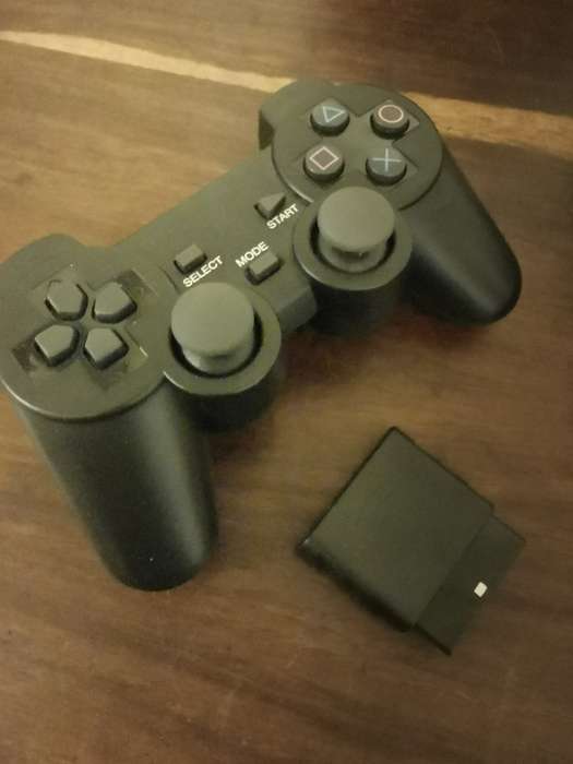 PlayStation 2 with Wireless Remote and Memory Card Including CD Case with 13 Games