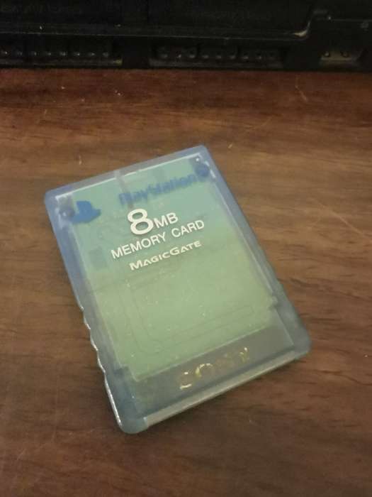 PlayStation 2 with Wireless Remote and Memory Card Including CD Case with 13 Games