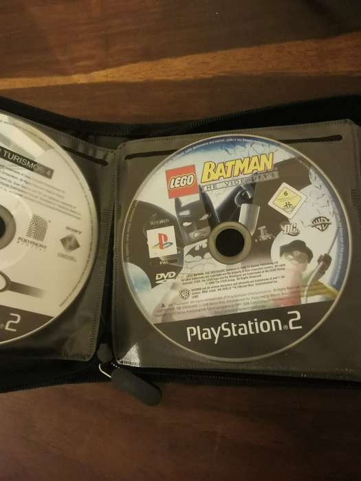 PlayStation 2 with Wireless Remote and Memory Card Including CD Case with 13 Games