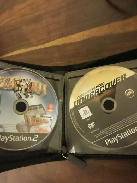PlayStation 2 with Wireless Remote and Memory Card Including CD Case with 13 Games