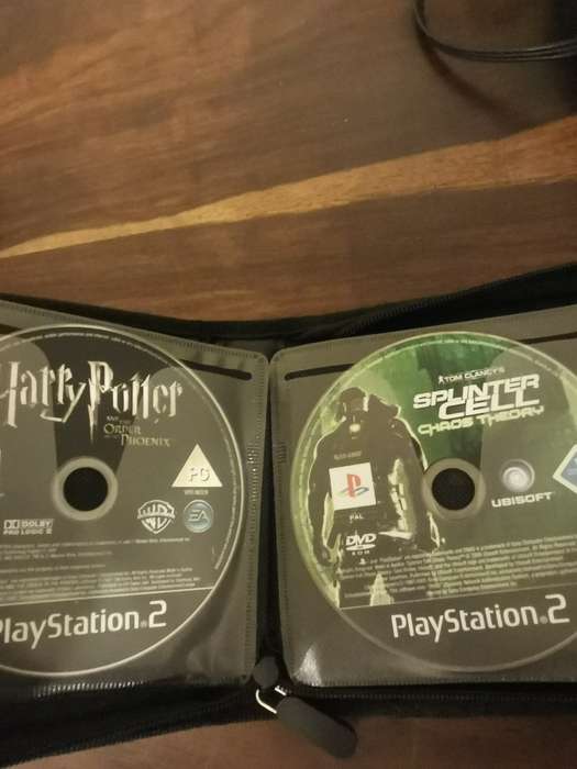 PlayStation 2 with Wireless Remote and Memory Card Including CD Case with 13 Games