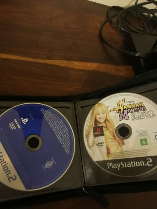 PlayStation 2 with Wireless Remote and Memory Card Including CD Case with 13 Games