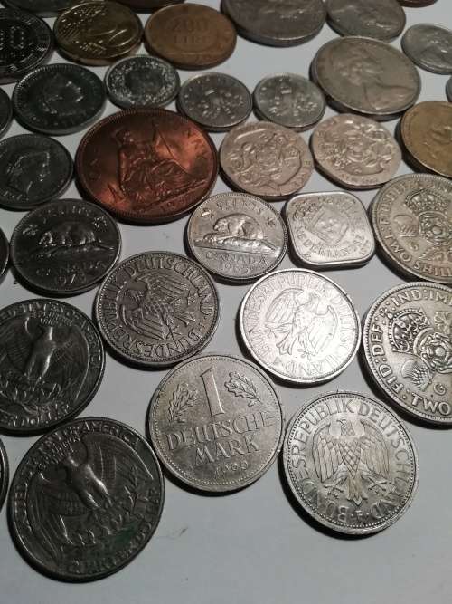 55 Mixed International coins. One bid for the lot
