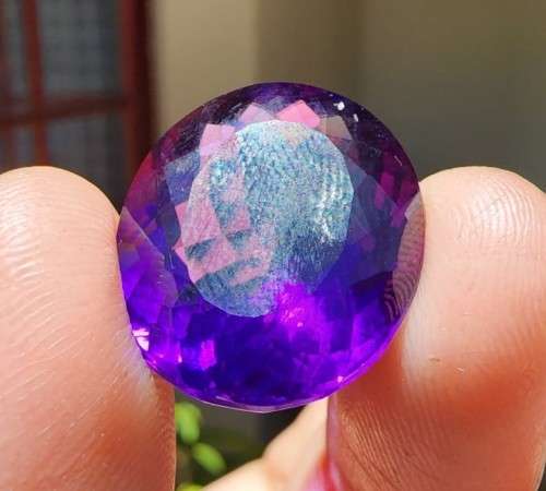 COLOR SHIFTING LARGE 21.65CT AMETHYST GEMSTONE WITH BEAUTIFUL OVAL CUT