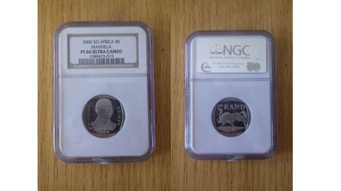 Nelson Mandela and Inauguration proof coins.