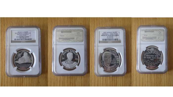 Nelson Mandela and Inauguration proof coins.