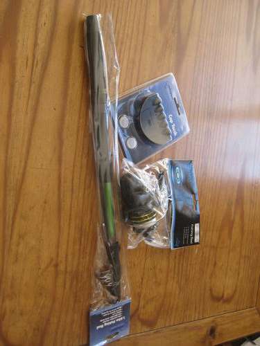 Telescopic fishing rod with reel and cap light.