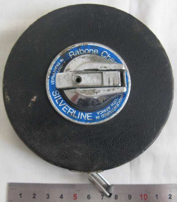 RABONE SILVERLINE HAND WINDING MEASURING TAPE. SIGNIFICANT WEAR & TEAR AS PICTURED.
