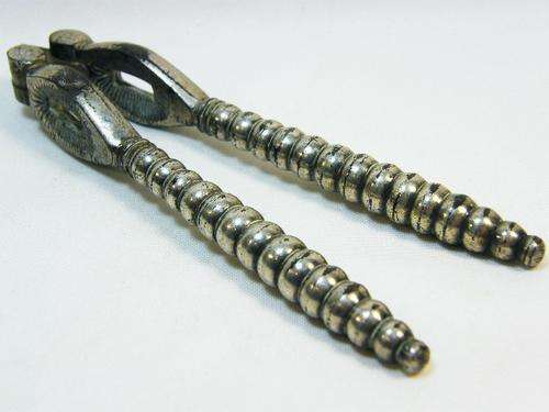 Vintage silverplated nutcracker with banded handles - as per photo