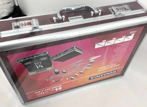 BRAND NEW ROMANIA 84 PIECE CUTLERY SET IN BRIEFCASE
