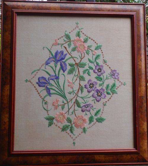 Vintage beautiful embroidery on linen - well framed in arty frame.