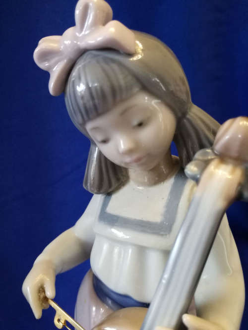 Lladro Nao Girl Playing Cello