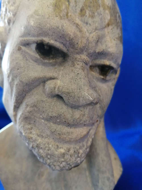 Quality vintage hand carved African men stone sculptures