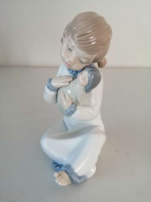 Nao by Lladro figurine, `Girl with Pigtails and Baby Doll` #5102