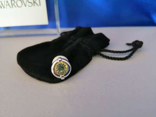 SWAROVSKI EVENT PIN 2002 ROUND RHODIUM BLUE / ISADORA RETIRED #