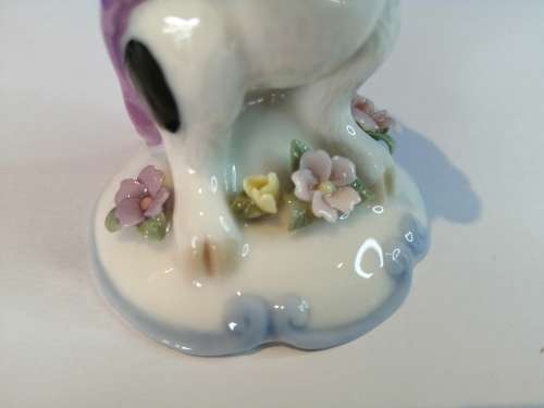 Old Porcelain Pig Playing the Flute