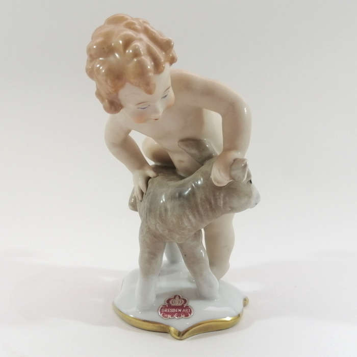 West German Alka Kunst Figurine Depicting a Putto with Lamb