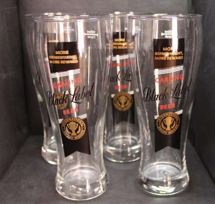 Set of Four Carling Black Label 500ml Beer Glasses.
