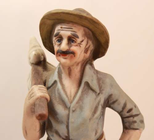 Vintage Porcelain Figurine of Old Man with Knapsack on Shoulder
