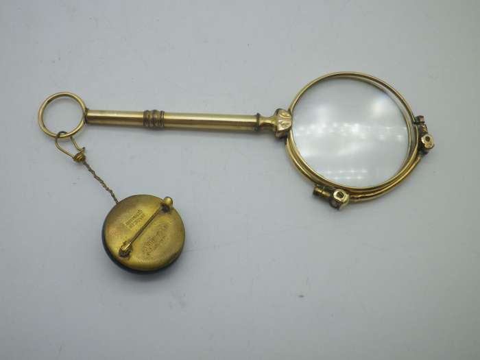 Vintage Gold Plated spring loaded lorgnette with brooch attachment. Made in Germany