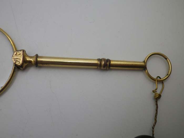 Vintage Gold Plated spring loaded lorgnette with brooch attachment. Made in Germany
