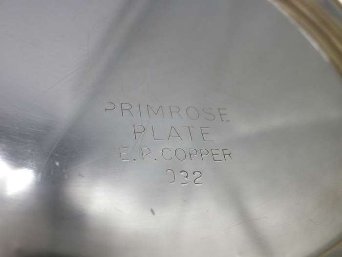 Vintage Silver plate on Copper wine bottle holder with pierced detail. Primrose Plate, England