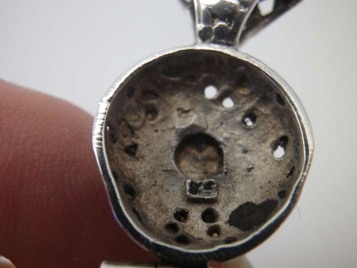 Sterling Silver Hand made Vintage pendant with beautiful detail and semi precious stone.