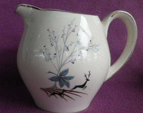 LARGE vintage Alfred Meakin milk jug. Pretty leaping buck on cream design. Very good condition