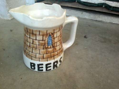 AN AWESOME COLLECTIBLE VINTAGE `CASTLE BEER` JUG BY DROSTDY WARE GRAHAMSTOWN POTTERS LTD