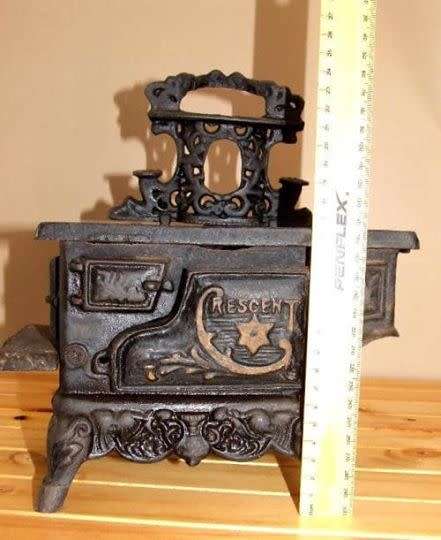 Doll's "Crescent" Coal Stove No cracks or breaks but would need a scrub