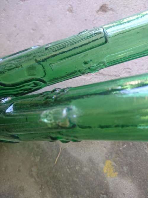 Cool pair vintage green glass decanters One do have a small hole that need to be fixed