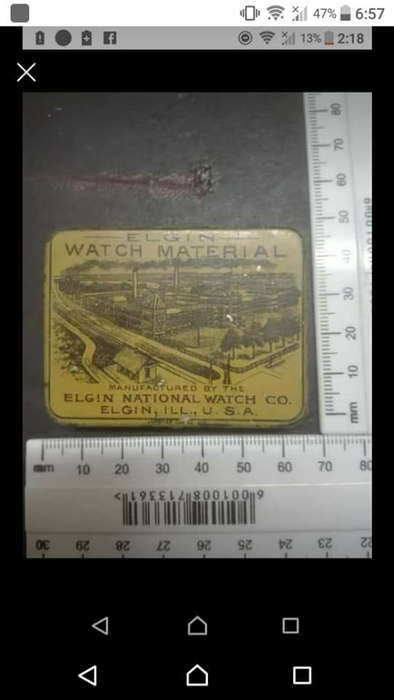 Antique Victorian Elgin National pocket watch parts. Six small brass tins inside bigger tin with sma