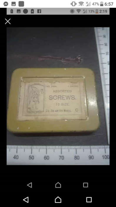 Antique Victorian Elgin National pocket watch parts. Six small brass tins inside bigger tin with sma