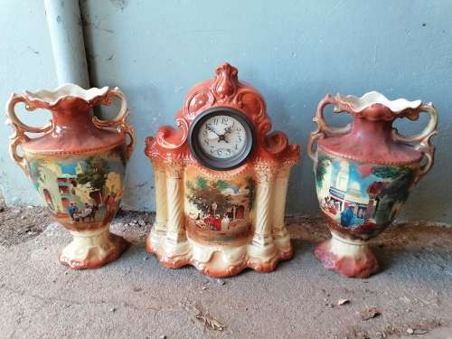 Wow stunning old porcelain Mantle set. Clock needs a service