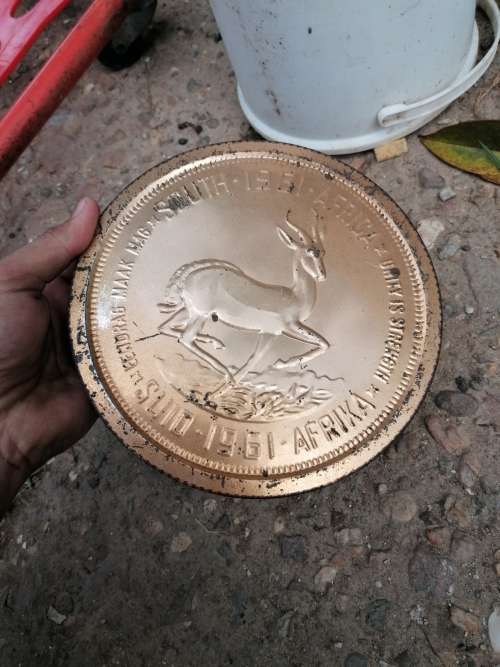 Awesome Rare 1961 tin in the shape of a coin