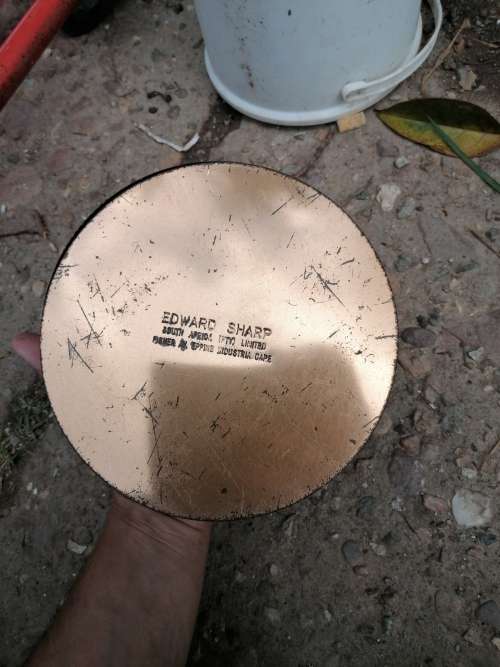 Awesome Rare 1961 tin in the shape of a coin
