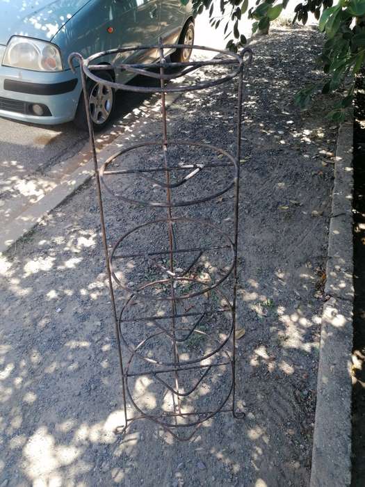 Vintage iron kitchen pot stand.