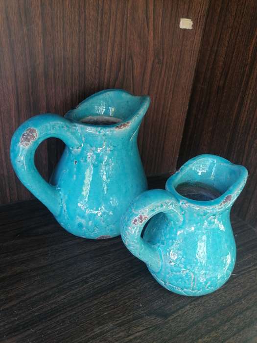 2 decor pitchers.