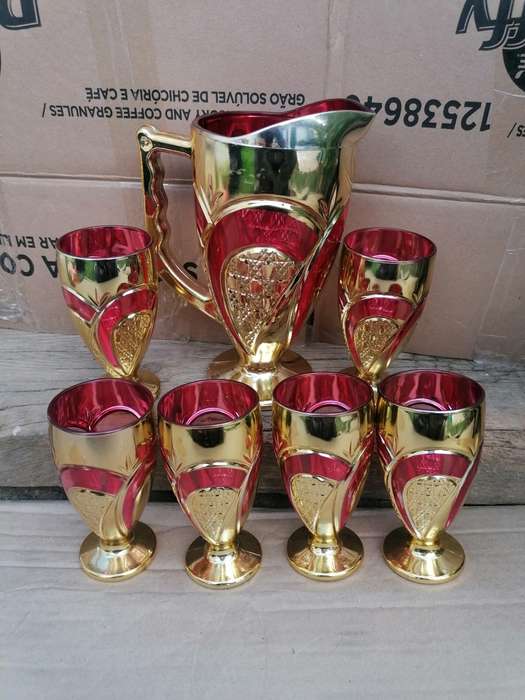 Stunning glassware set. One cup have a chip on the bottom other than that in good condition.