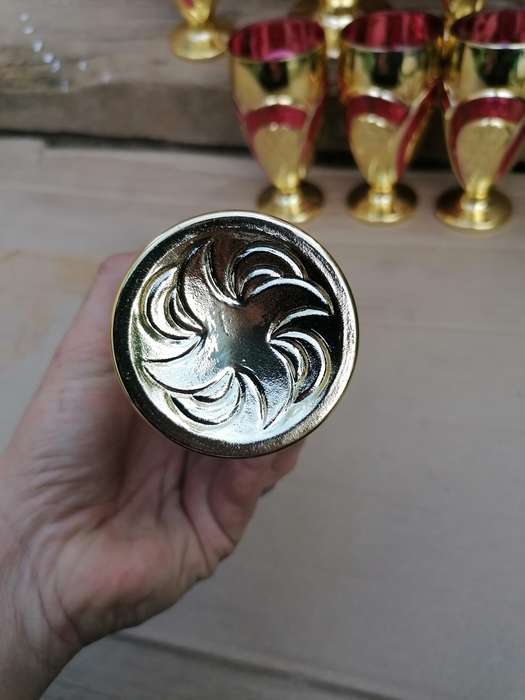 Stunning glassware set. One cup have a chip on the bottom other than that in good condition.