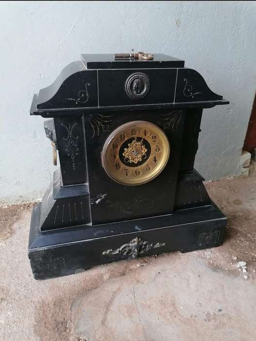Rare Antique black marble mantle clock |