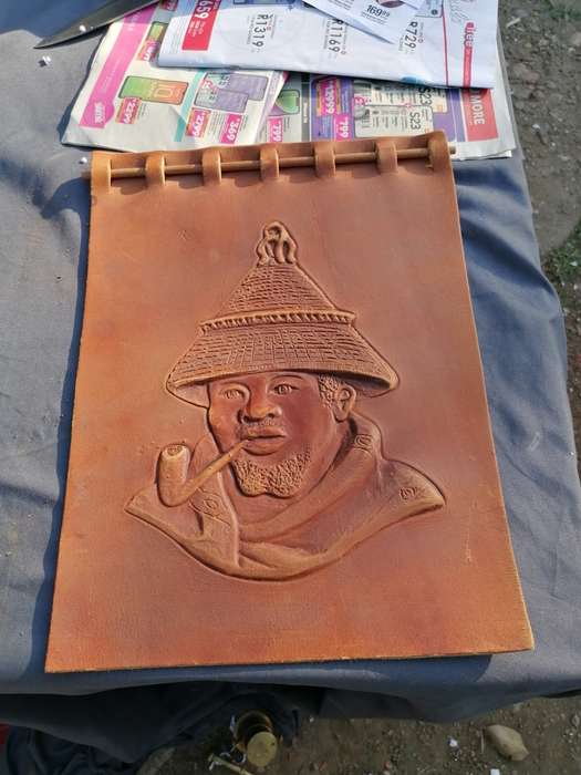 vintage african tooled leather wall art
