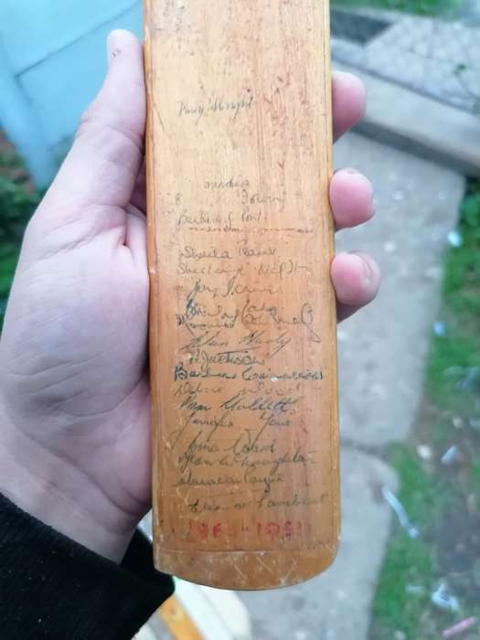 Signed minature cricket at. Appears to be dated 1960s