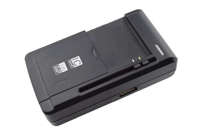 Universal Charger for Cellphone/Flat Battery with USB Charging Port (Black)..!