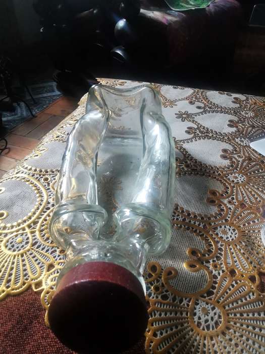 VINTAGE UNUSUAL ASHTRAY IN THE SHAPE OF A BOTTLE