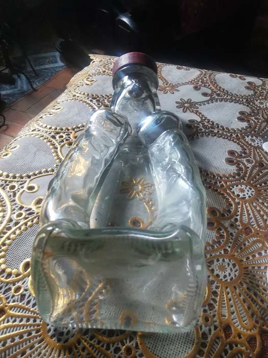 VINTAGE UNUSUAL ASHTRAY IN THE SHAPE OF A BOTTLE