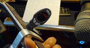 Free shipping!  LCD Mini Clip-On Chromatic Tuner with Back light for Guitar,Bass,Violin etc.